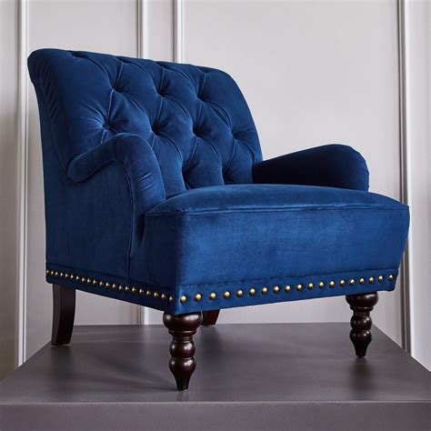 navy blue armchair and footstool.